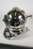 A chrome plated replica divers helmet, 17" high