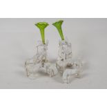Two C19th Parian figures of cherubs, with green glass epergne flutes on their backs. 5" high,