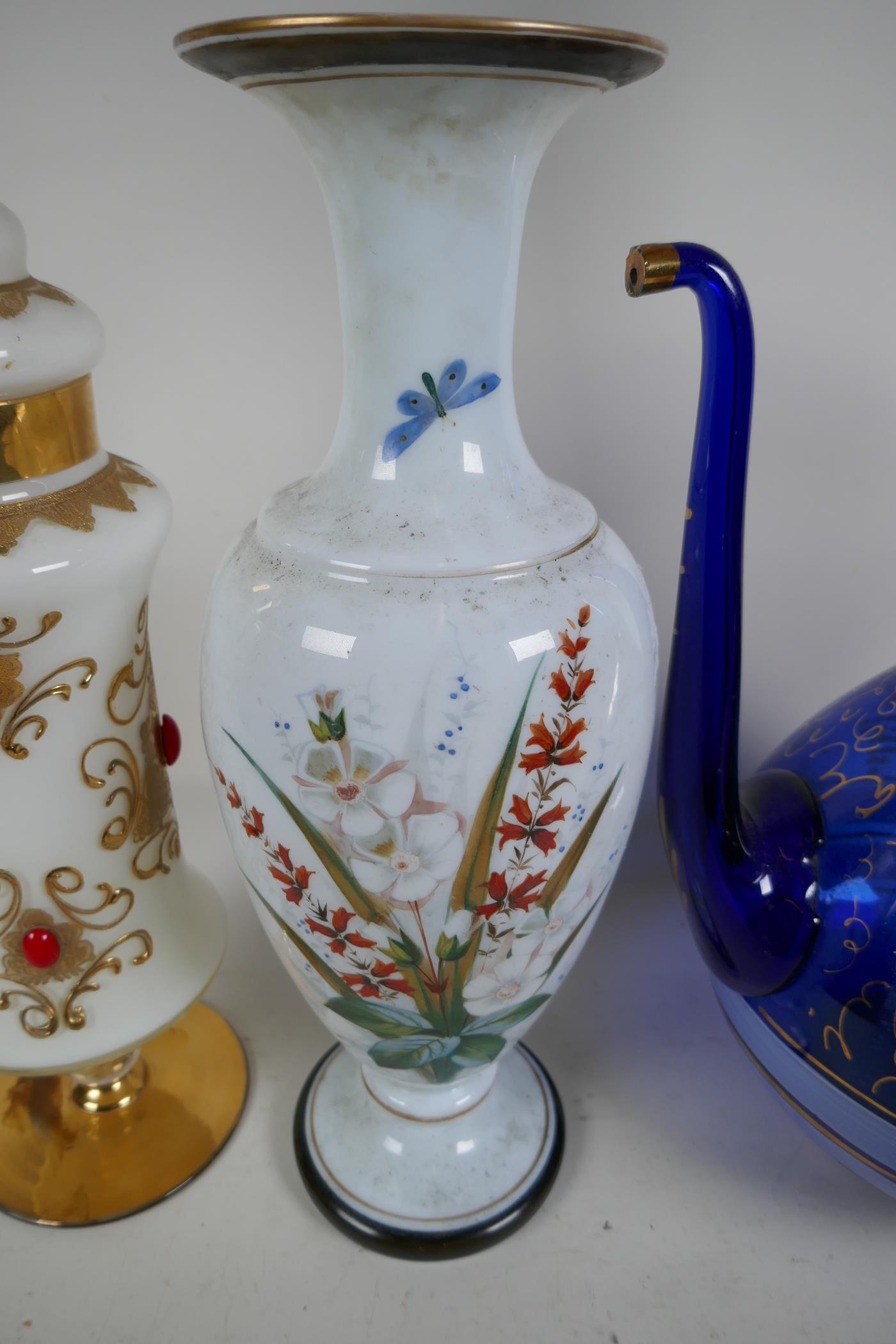 A gilt decorated blue glass wine ewer and stopper, 19" high, a milk glass vase painted with flowers, - Image 3 of 4