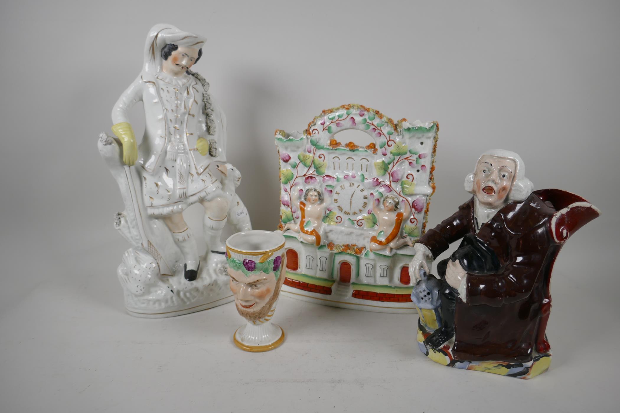 A 19th C Staffordshire flat back clock piece (11" high), together with a figurine of a Hunter and