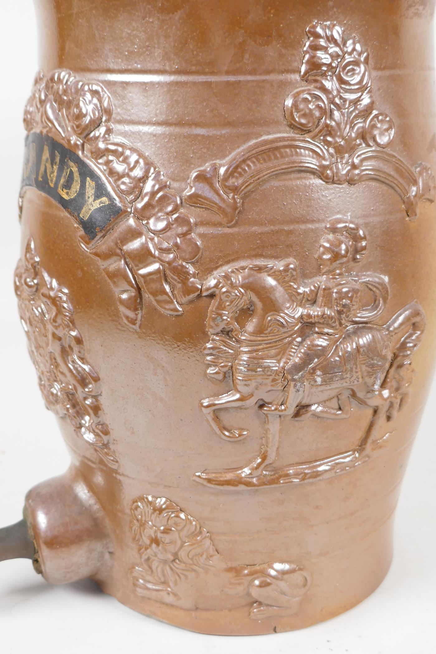 A C19th salt glazed stoneware brandy barrell, embossed with figures of knights on horseback, lions - Image 4 of 4