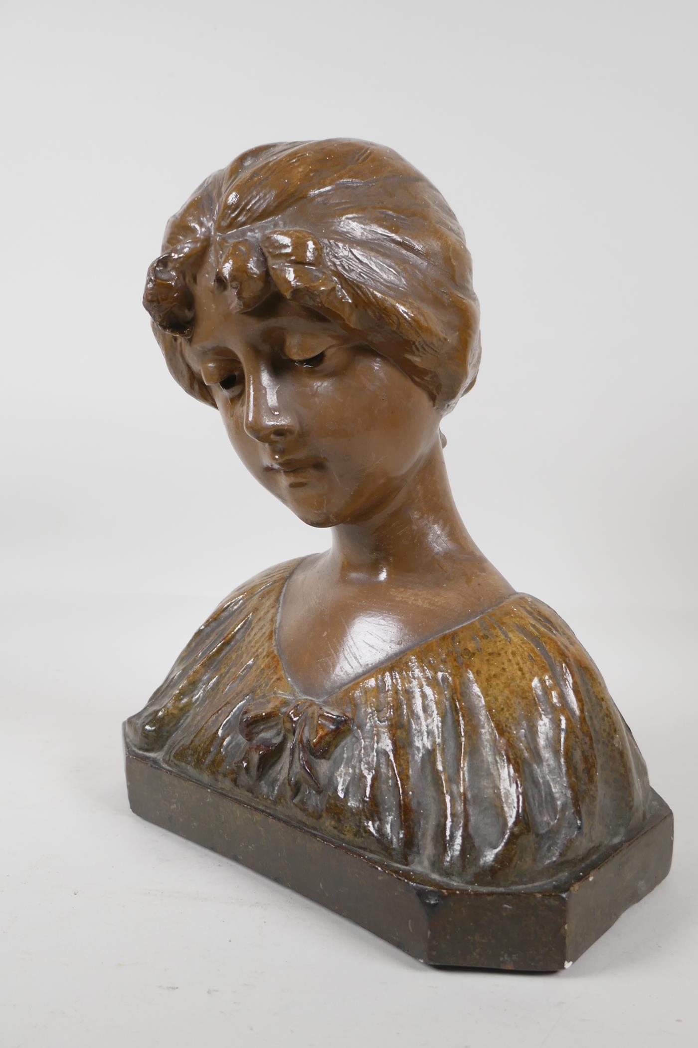 A glazed terracotta bust of a girl in a shawl. 12 high - Image 2 of 2