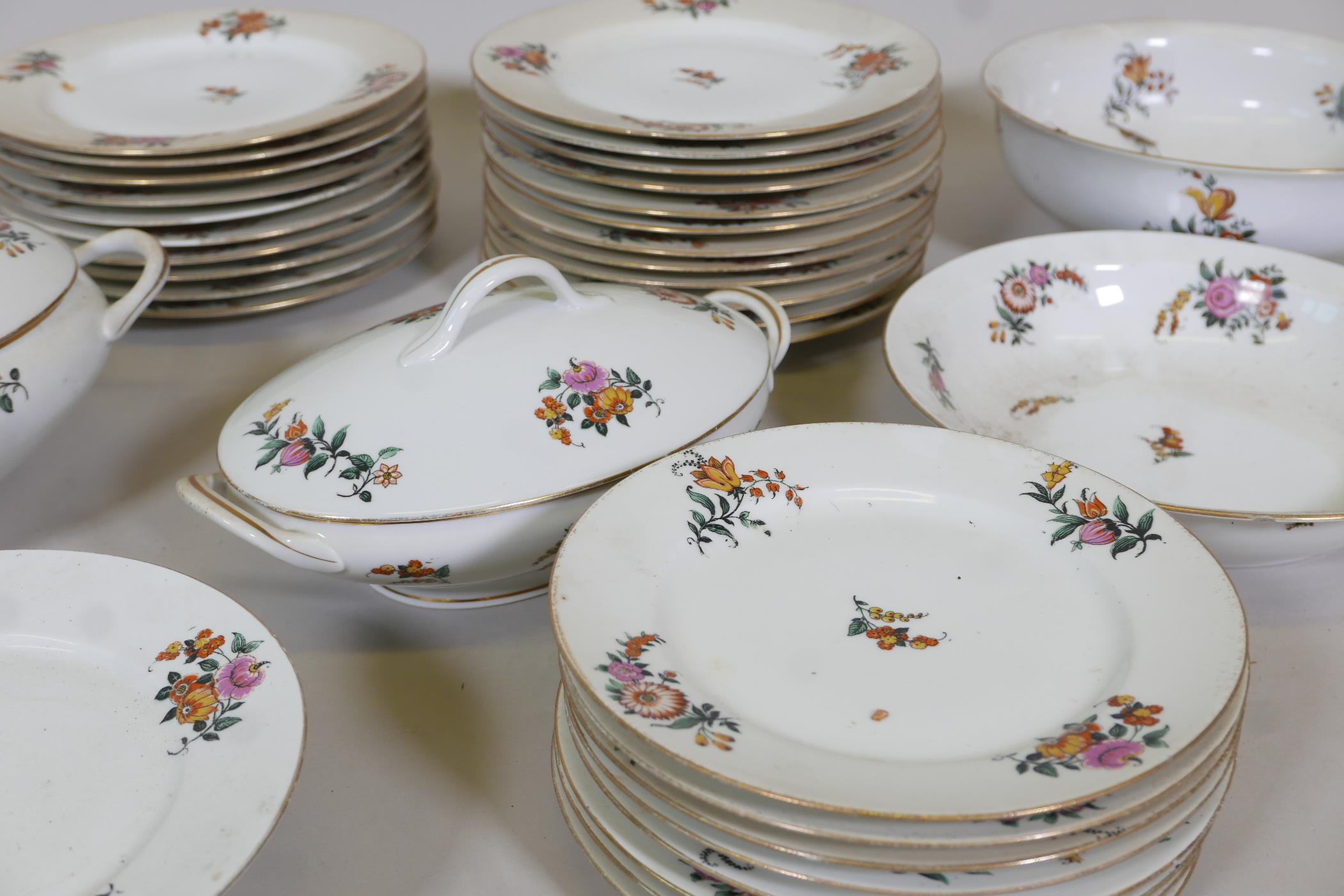 A Limoges floral decorated part dinner service comprising 10" and 12" oval tureens and covers, two - Image 5 of 6