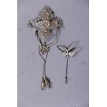 A vintage white metal filigree brooch, A/F, and a hat pin