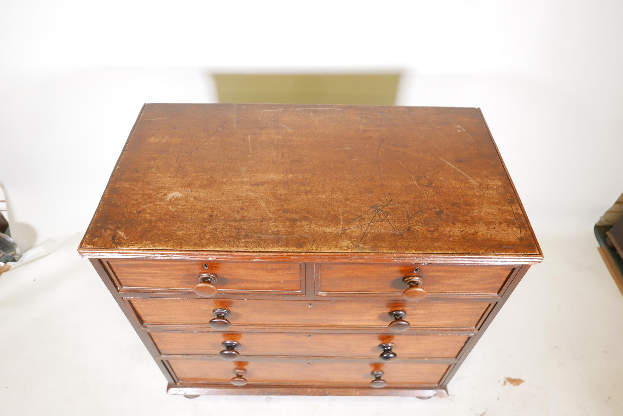 A early C19th mahogany chest, of 2 over 3 graduated drawers, raised on turned supports. 36" x 19½" x - Image 2 of 6