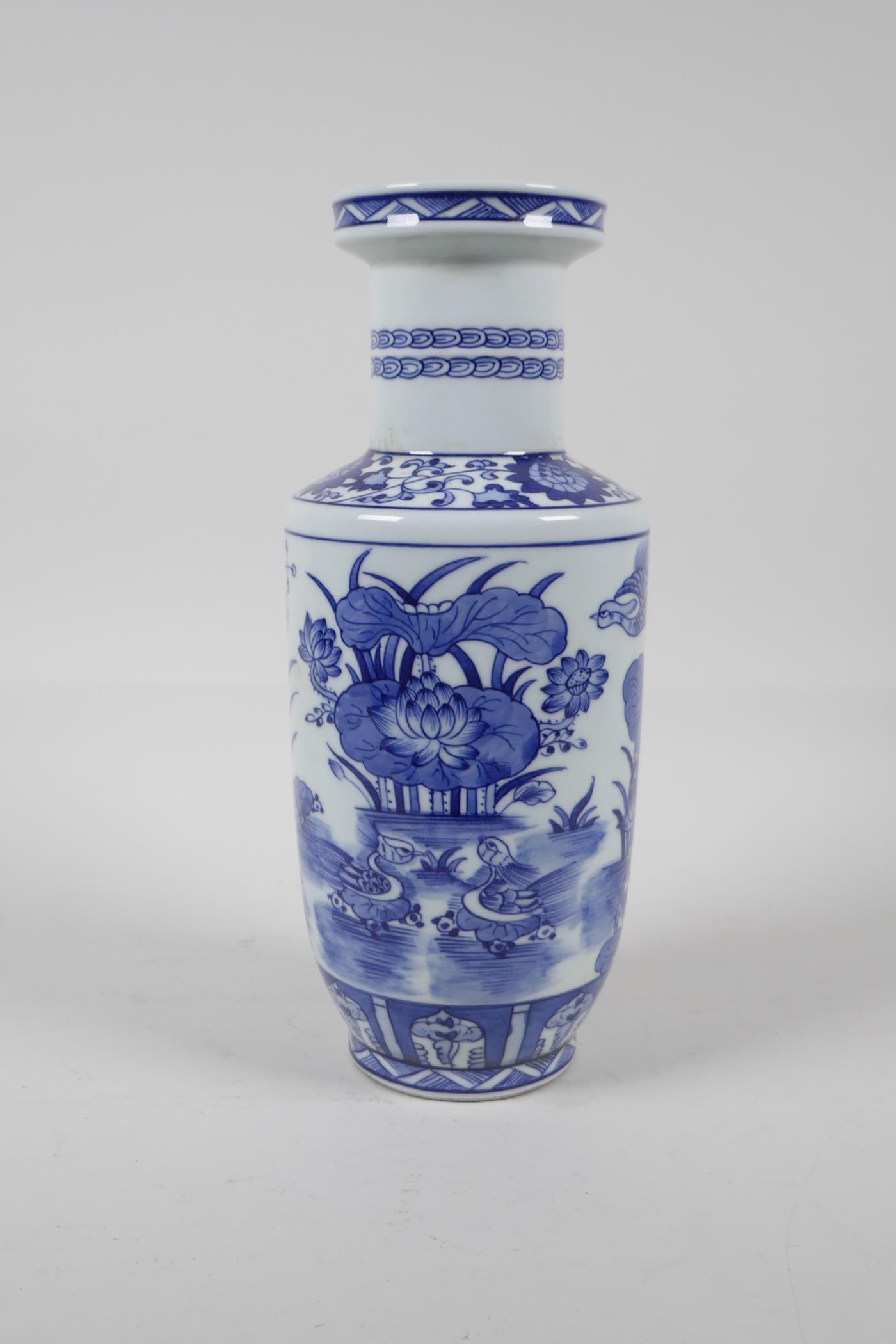 A blue and white porcelain rouleau vase decorated with waterfowl in a lotus pond, Chinese Kangxi - Image 3 of 5