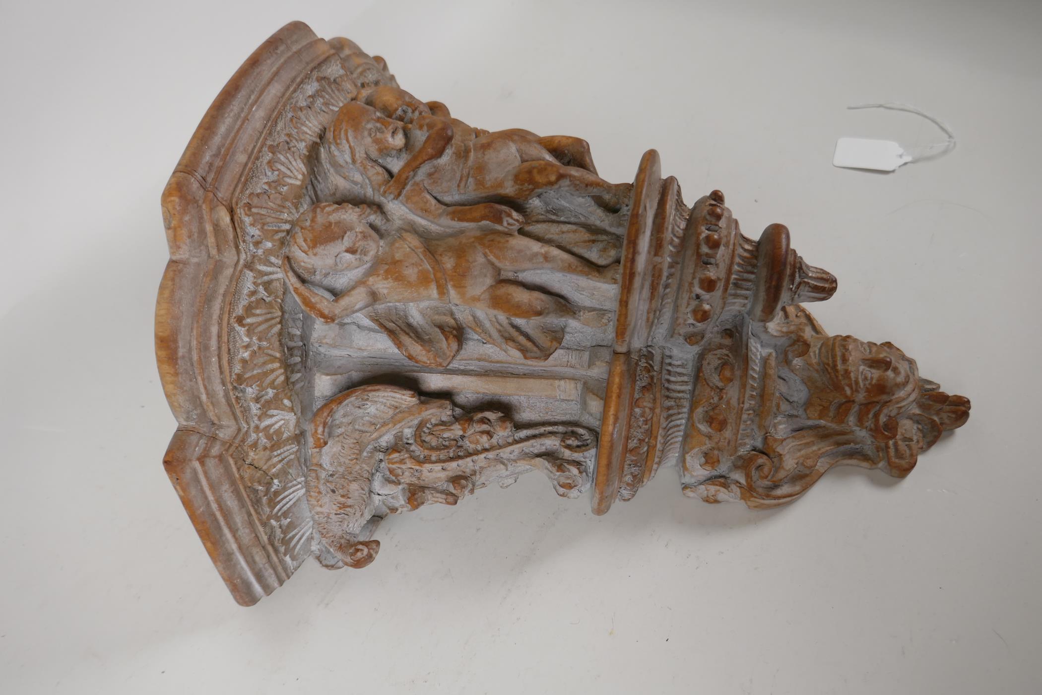 An ornately carved wood wall bracket. Carved in the form of a classical column capital. 13" long - Image 2 of 5
