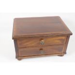 An Edwardian mahogany two drawer jewellery chest, with cross banded decoration to top and drawer