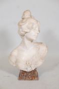 Julien Caussé, an Art Nouveau carved alabaster bust of a woman with a garland of ivy, signed Julien,