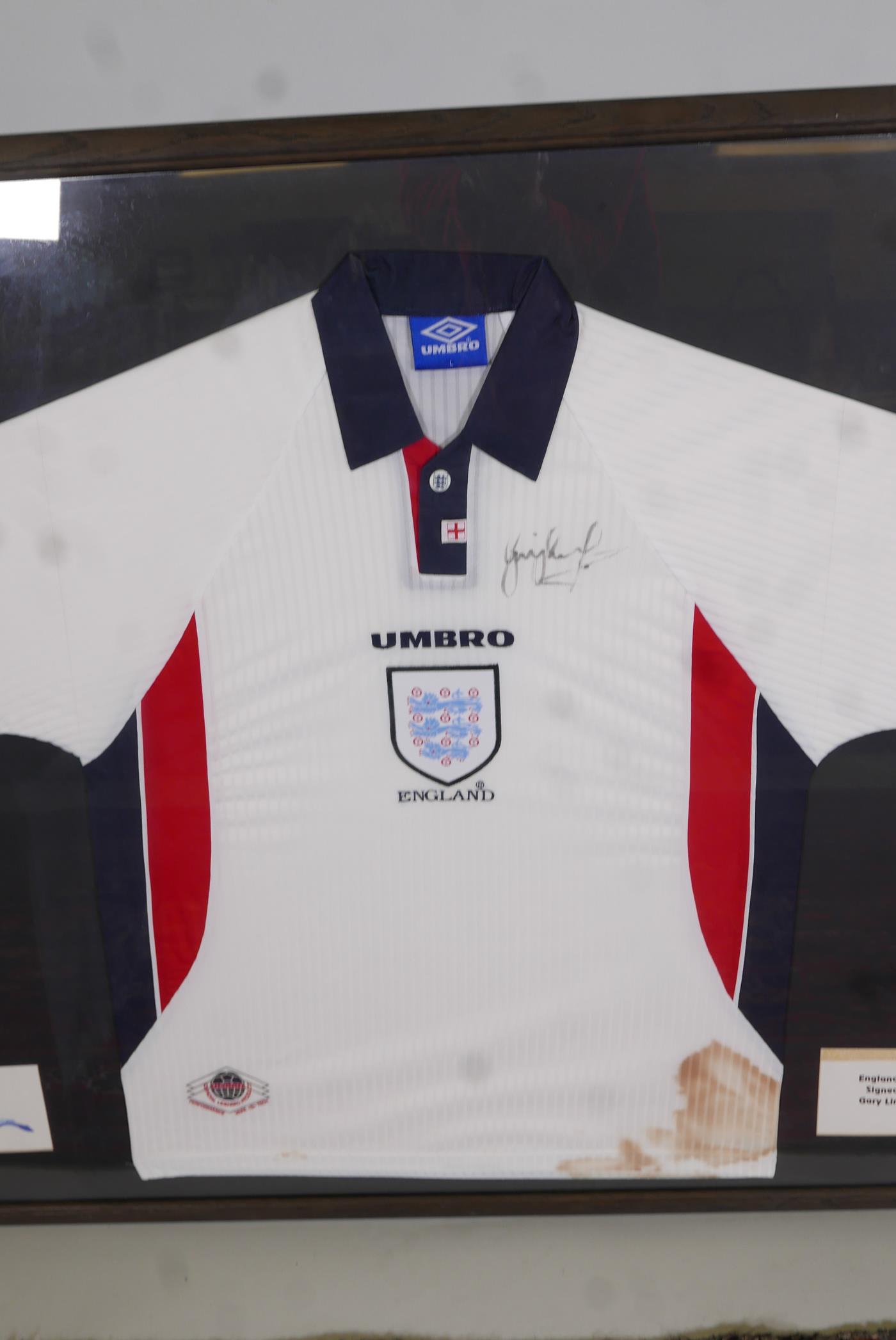 A framed 1998 England World Cup football shirt, purportedly signed by Gary Lineker. 44" x 37" - Image 3 of 4
