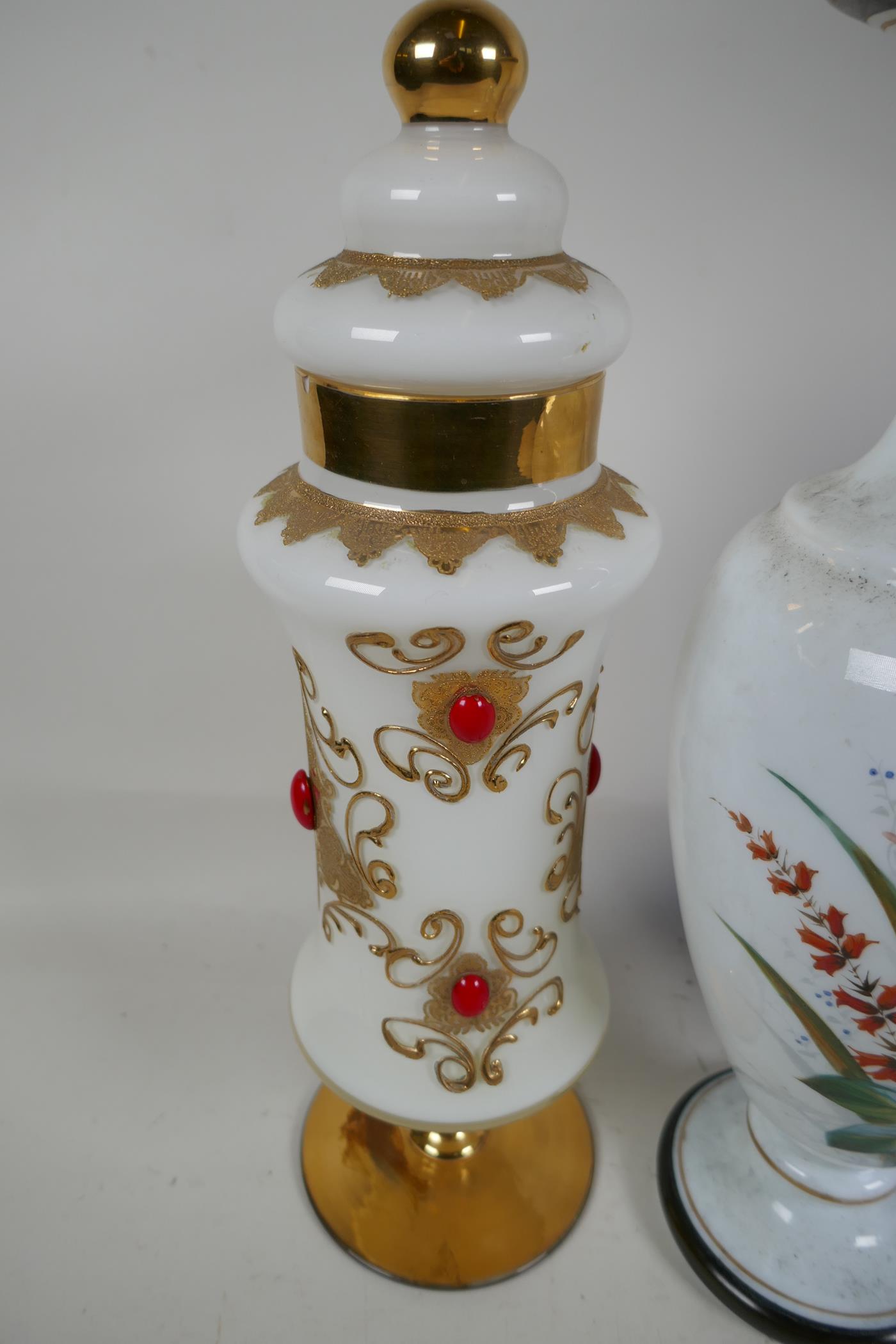 A gilt decorated blue glass wine ewer and stopper, 19" high, a milk glass vase painted with flowers, - Image 4 of 4