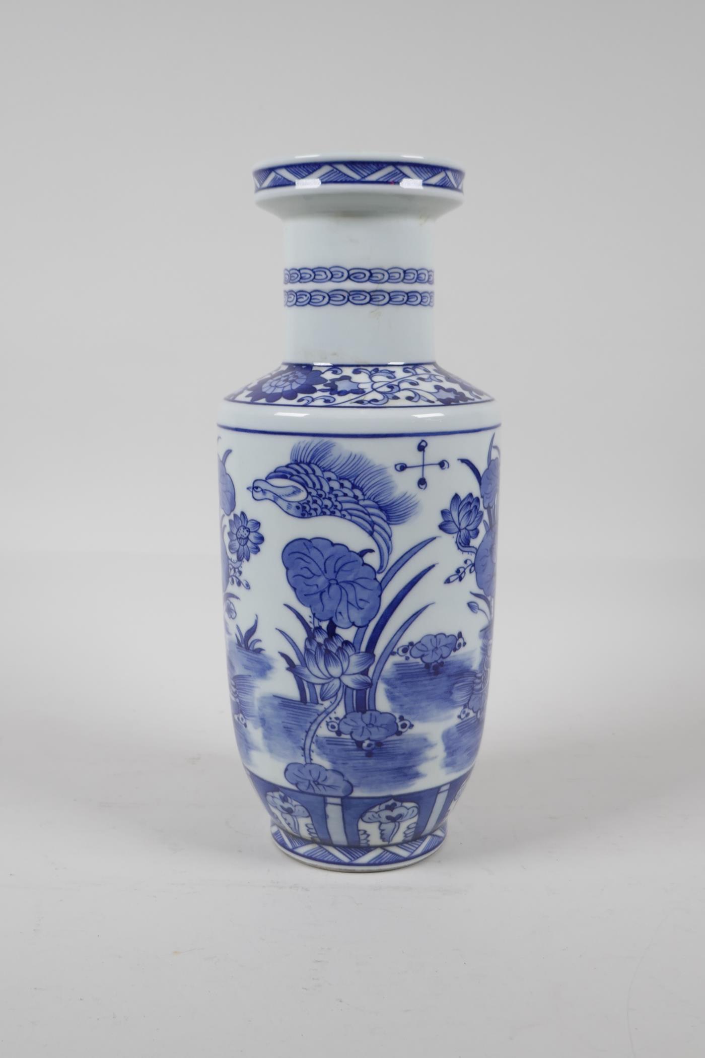 A blue and white porcelain rouleau vase decorated with waterfowl in a lotus pond, Chinese Kangxi - Image 4 of 5