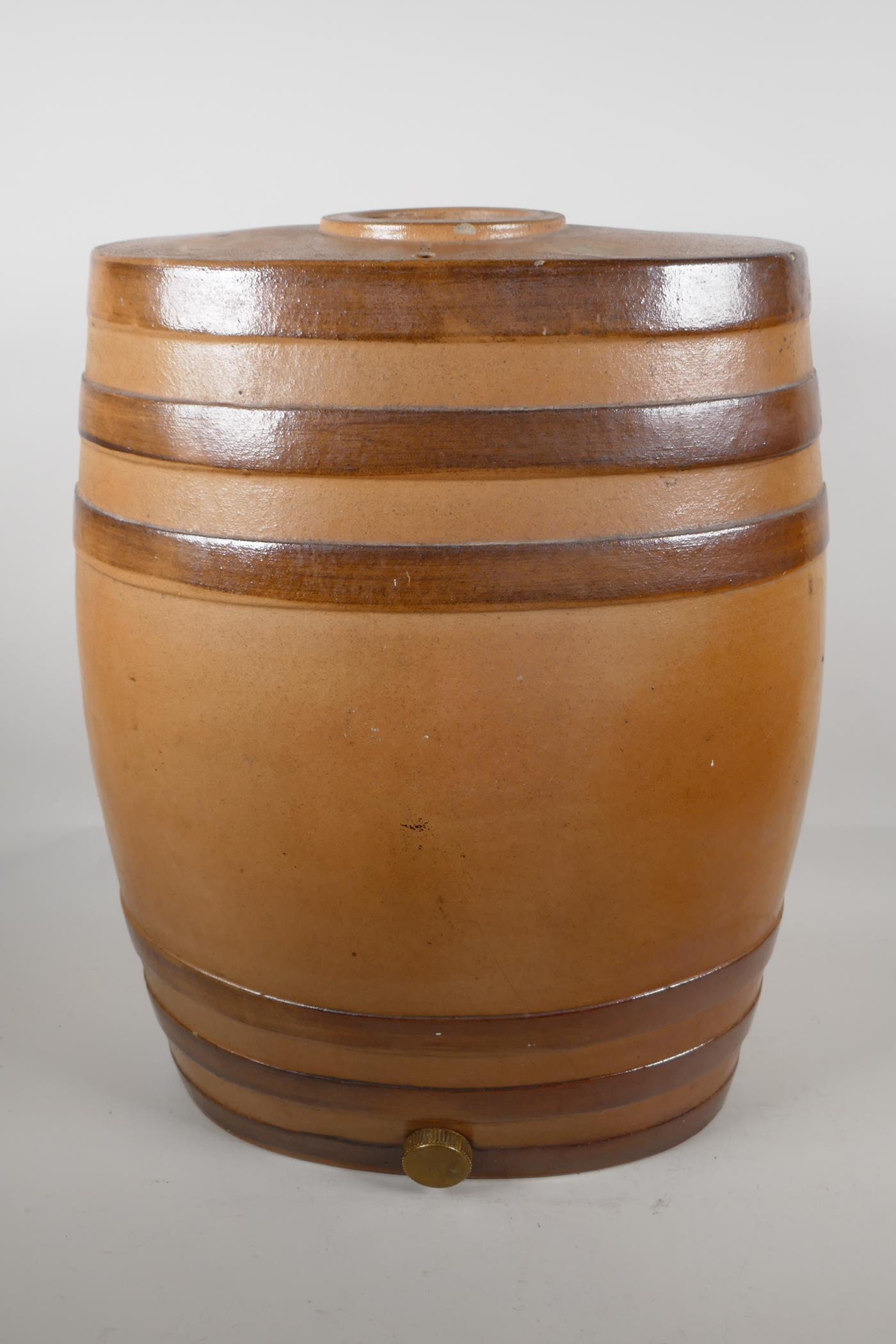 A large C19th stoneware barrel impressed J. Stiff pottery, Lambeth, London. 19" high