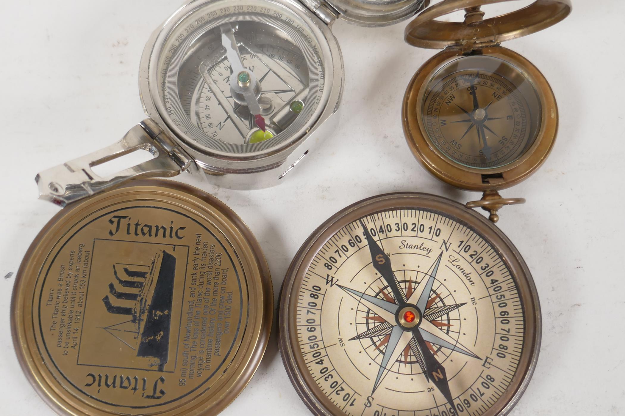 A Novelty brass cased compass, with the details of the Titanic on the cover. Together with a - Image 2 of 2