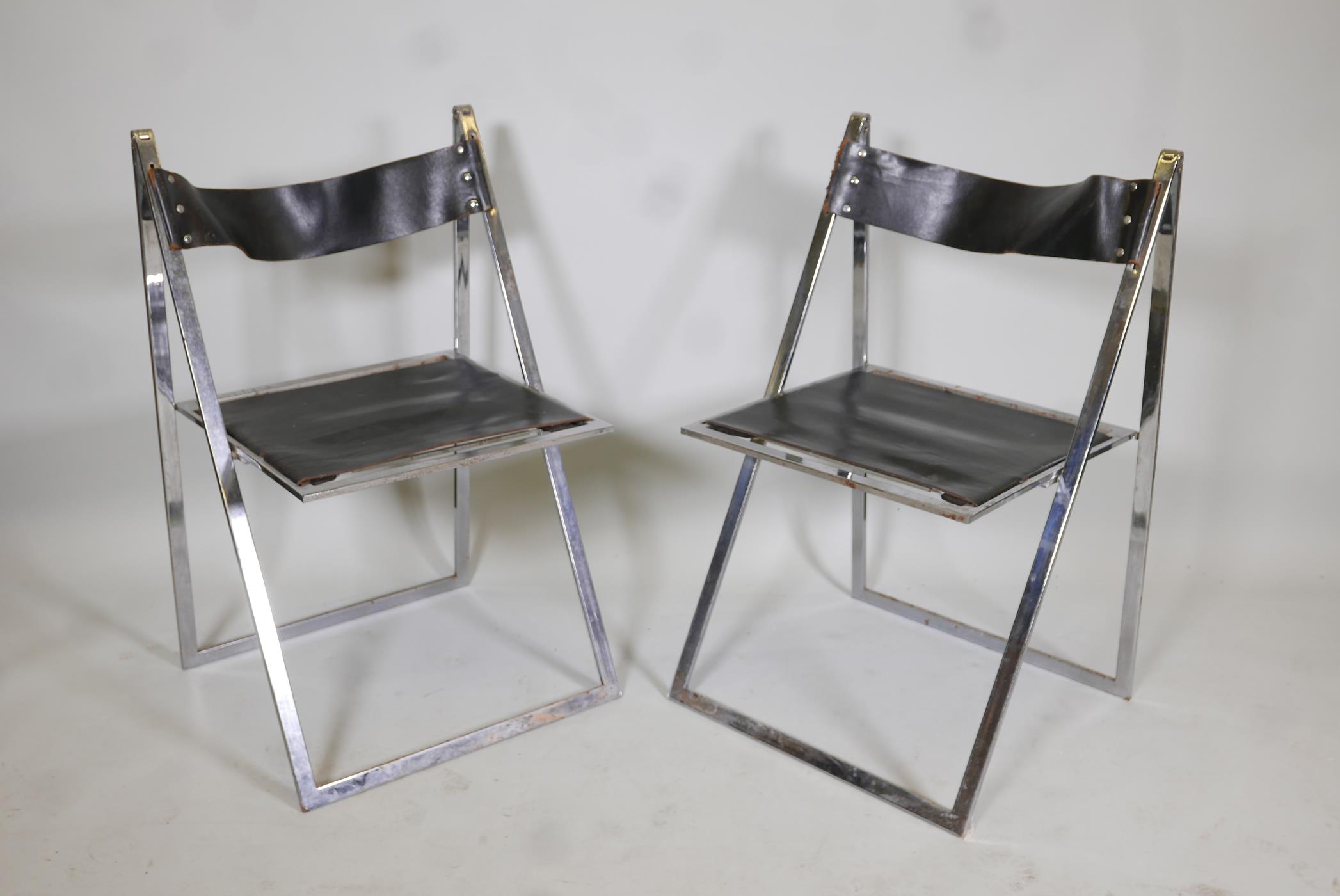 A pair of Italian mid century Elios chrome & leather folding chairs, designed by Fontoni & Geraci,