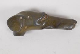A C19th carved horn parasol handle, carved as a greyhound head. 3½" long