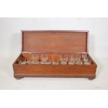 A 19th C mahogany cased "Glass Harp", containing a suite of drinking glasses, adapted to be played