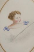 A 19th C Watercolour portrait of a young child, in a good oval gilt frame, portrait 6" x 5"