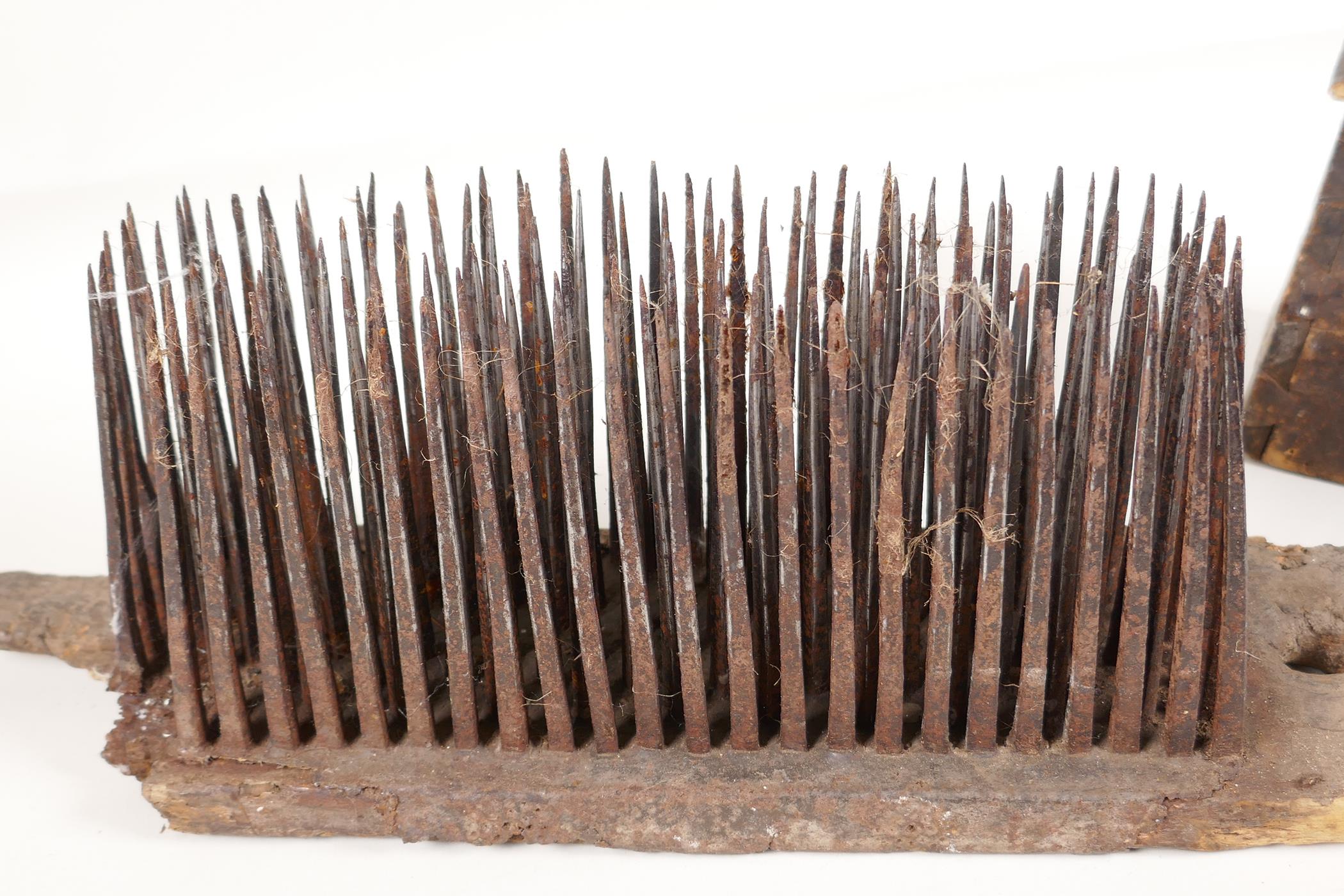 A vintage iron nail and wood wool carder. 14" long x 5½" high - Image 3 of 3
