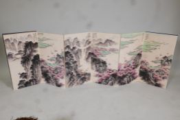 A Chinese concertina book, containing ten mountain and riverside landscapes, overpainted prints,