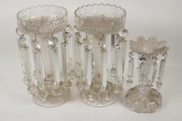 A pair of C19th clear glass table lustres (1 drop missing), 12½" high, and another smaller lustre (1