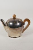 A Carlo Alessi silver plated bombe teapot, 6" high