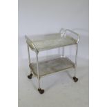 An industrial tubular metal tea trolley, 27" x 16", 31½" high