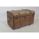 A metal and bentwood strapped canvas travel trunk, 32" x 20", 20" high