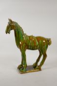 A Chinese tang style pottery horse with Sancai slip glaze, 12½" high