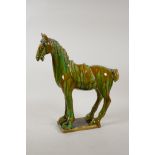 A Chinese tang style pottery horse with Sancai slip glaze, 12½" high