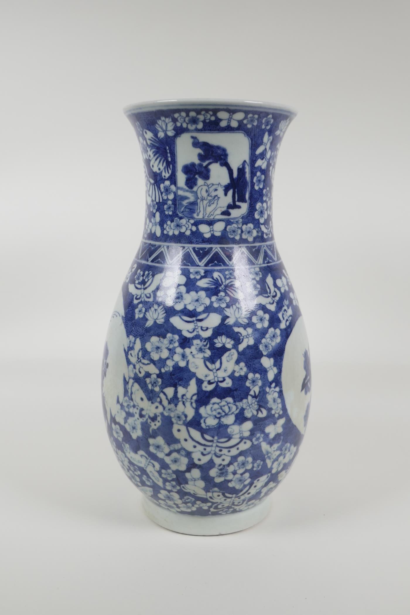 An early C20th Chinese blue and white porcelain vase with two decorative panels depicting birds - Image 4 of 5