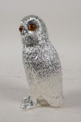 A silver plated owl shaped sugar sifter with glass eyes, 6" high