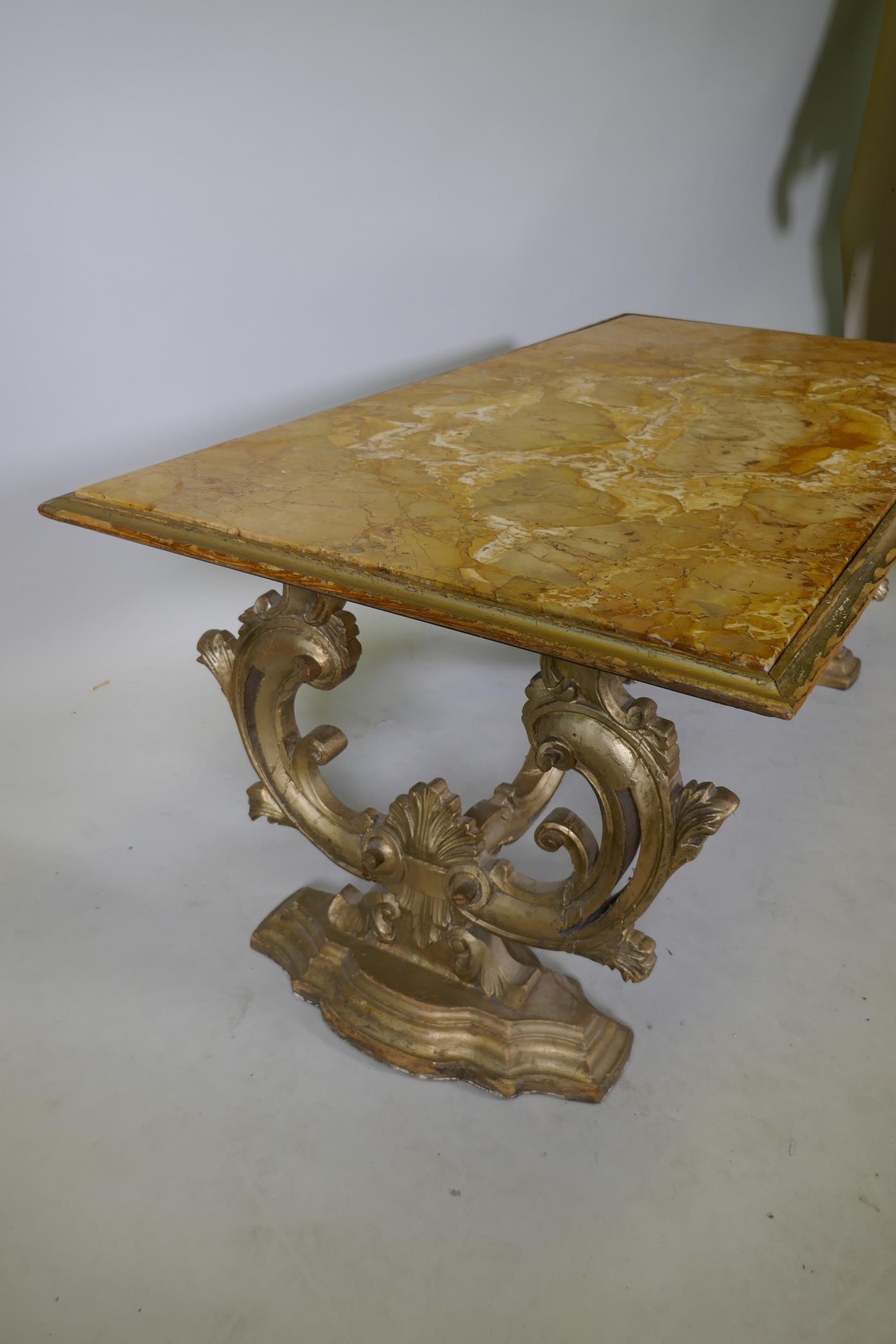 An Italian giltwood coffee table with Sienna marble top, raised on shaped and carved end supports, - Image 5 of 5