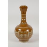 A Chinese garlic head shaped porcelain vase with a bamboo style glaze, and archaic decoration,