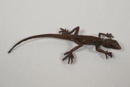 A Japanese bronze okimono in the form of a lizard, 6½" long