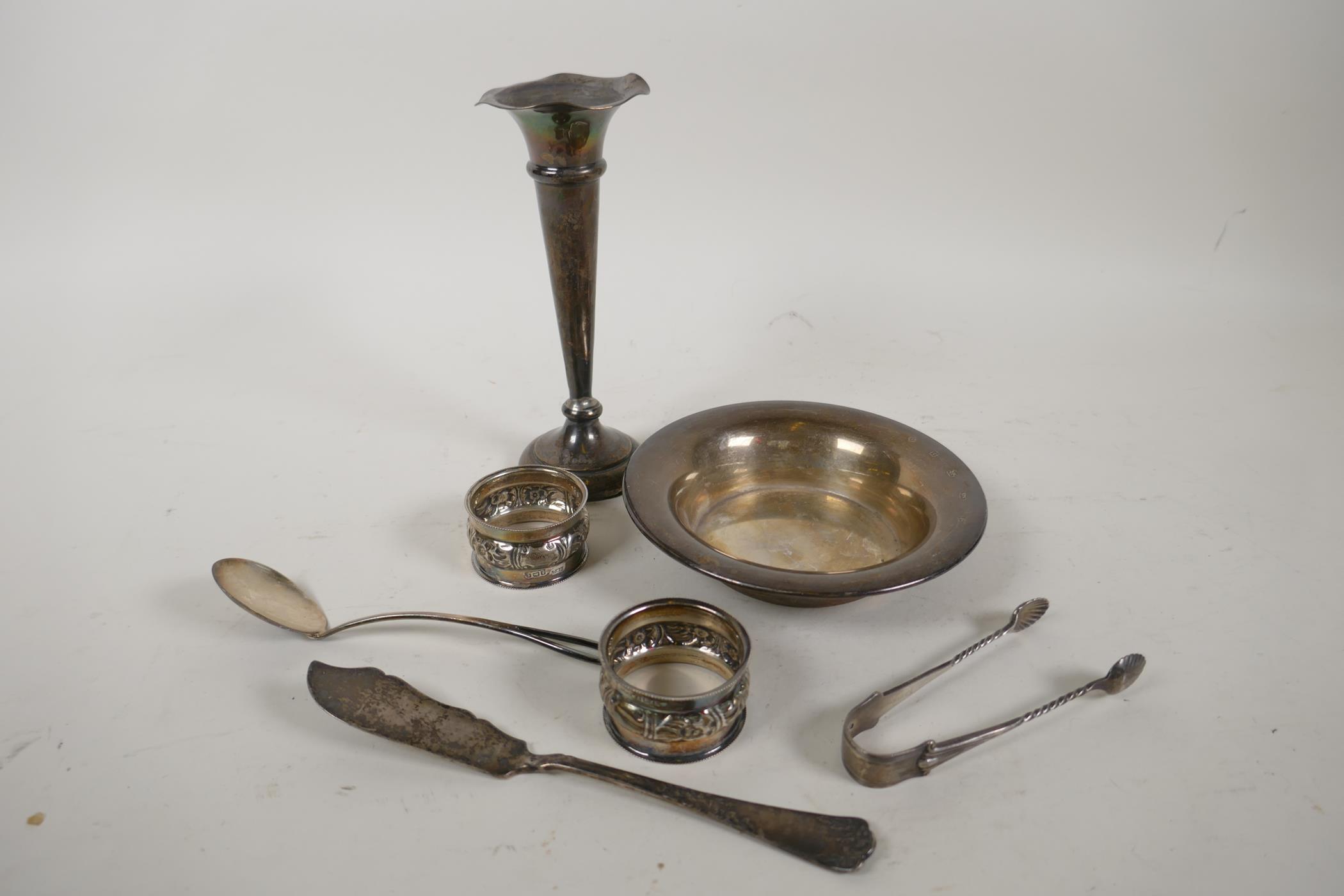 A hallmarked silver bowl, 5½" diameter, a 1904 silver specimen vase, a pair of napkin rings,