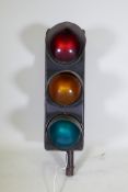 A set of road traffic lights, adapted, 11½" x 18½", 43" high