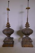 A pair of vintage oversize wood and plaster table lamps with painted and parcel gilt decoration, 53"