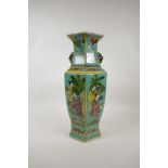 A Chinese turquoise blue ground porcelain hexagonal vase with two lion mask handles and decorative