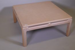 A contemporary bleached beechwood and walnut coffee table, 36" x 36" x 16"