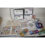 Three albums of World stamps, an album of eighty first day covers, and a quantity of Royal