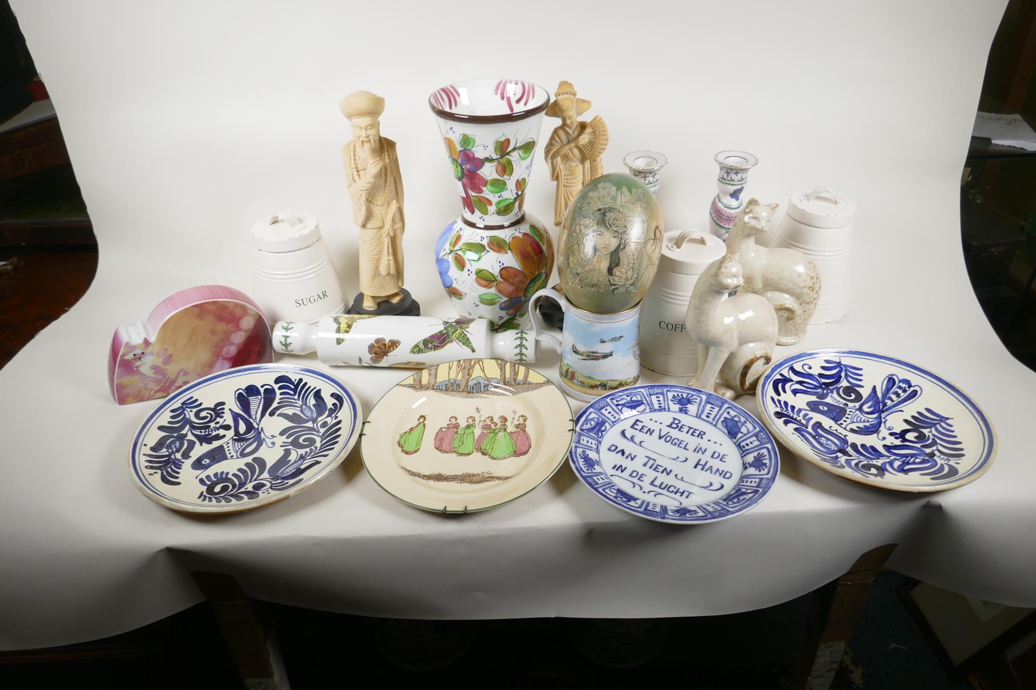 A quantity of pottery and porcelain including Portmeirion rolling pin, Worcester 'Flat Mates' cat,