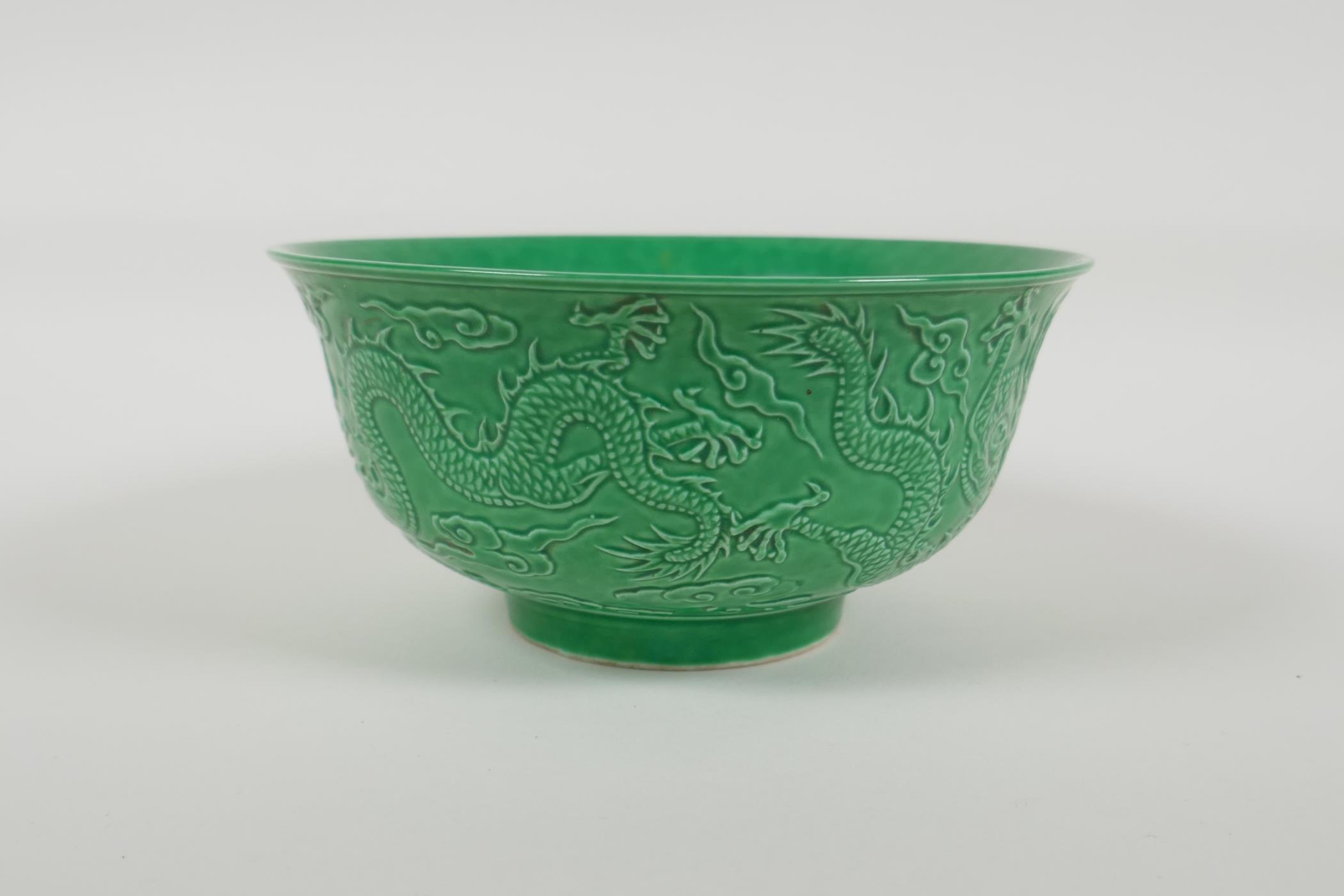 A green glazed porcelain rice bowl with raised dragon decoration, Chinese Yongzheng 6 character mark - Image 2 of 5