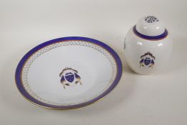 A Chinese export ware porcelain bowl with blue and gilt armorial decoration, and a matching ginger