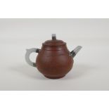 A Chinese Yixing teapot with celadon hardstone spout, handle and knop, the sides with chased