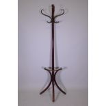 An antique Thonet bentwood coatrack, stamped to the leg, 76" high