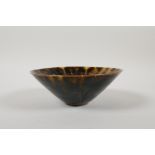 A Chinese tortoiseshell glazed pottery conical bowl, 6½"