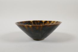 A Chinese tortoiseshell glazed pottery conical bowl, 6½"