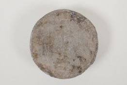 A Chinese white metal trade token/ingot, 4" diameter