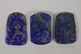 Three Chinese lapiz lazuli pendants with carved decoration of immortals and ruyis, 1½" x 2½"